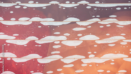 Fotografia Close up to rear window of car with bubbles on glass very poor substandard tint