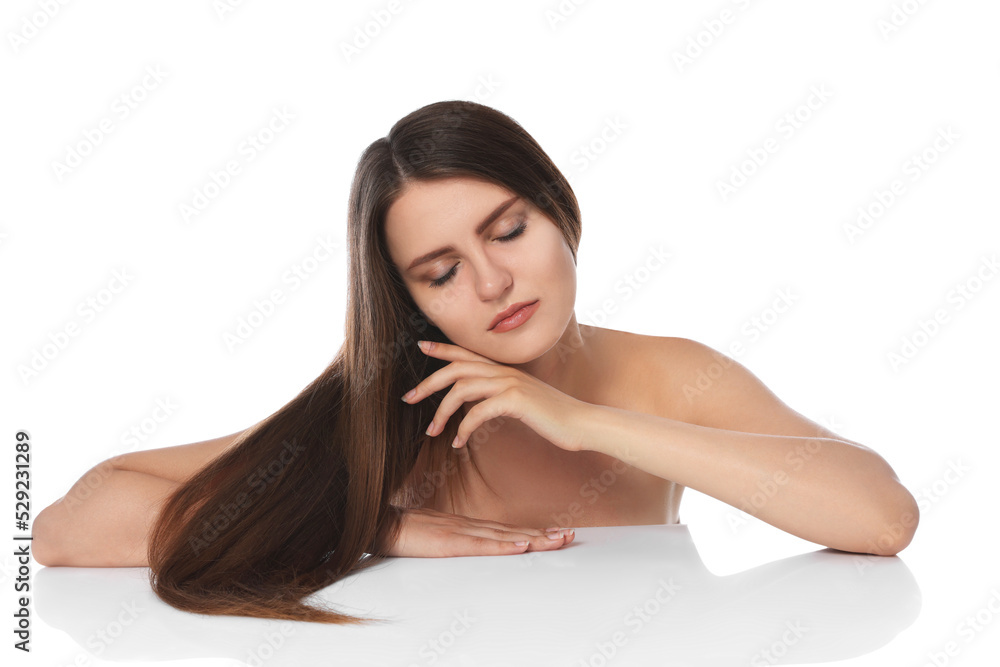 Young woman with strong healthy hair on white background Young woman with strong healthy hair on white background