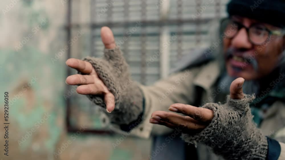 4k, Close Up The hand of an elderly homeless Asian man reaching out to beg passers-by for money and food in hopeful messages of help.. Homeless people who do not have home to sleep on streets 4k, Close Up The hand of an elderly homeless Asian man reaching out to beg passers-by for money and food in hopeful messages of help.. Homeless people who do not have home to sleep on streets