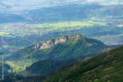 Fototapeta Naklejka Na Ścianę i Meble -  The silhouette of the Nosal peak against the background of Zakopane. Tatra Mountains.