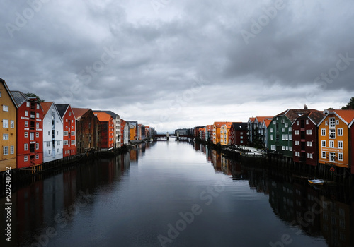 Colorful houses on both sides of Nidelva river from the Old Town Bridge - Trondheim, Norway