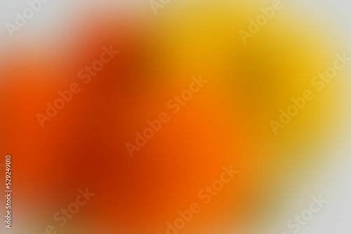 Abstract yellow-orange defocused background. Blurred lines and spots. Background for the cover of a laptop, notebook.