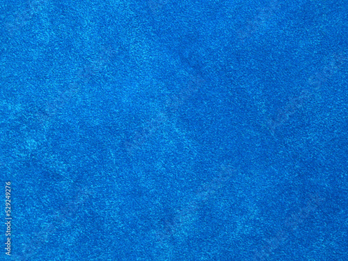 Light blue velvet fabric texture used as background. Empty light blue fabric background of soft and smooth textile material.