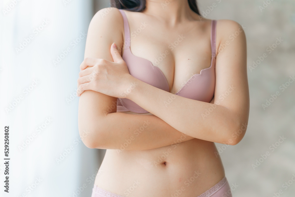 Close up sexy asian woman with sexy bra, hands crossed, love yourself and body, healthy concept.