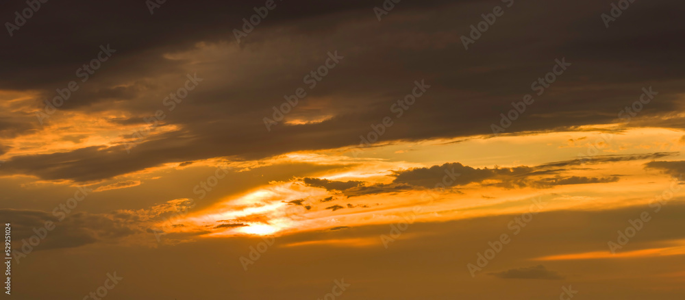 Golden cloudy sky background