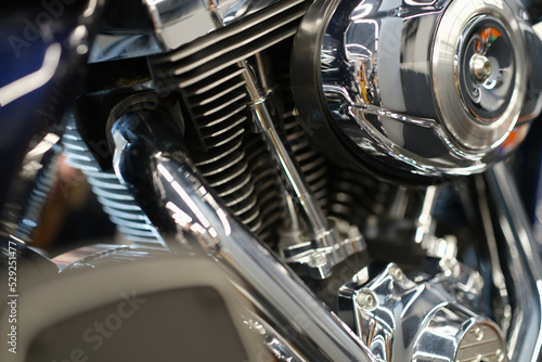 Chrome shiny motorcycle parts and motorcycle engine © H_Ko