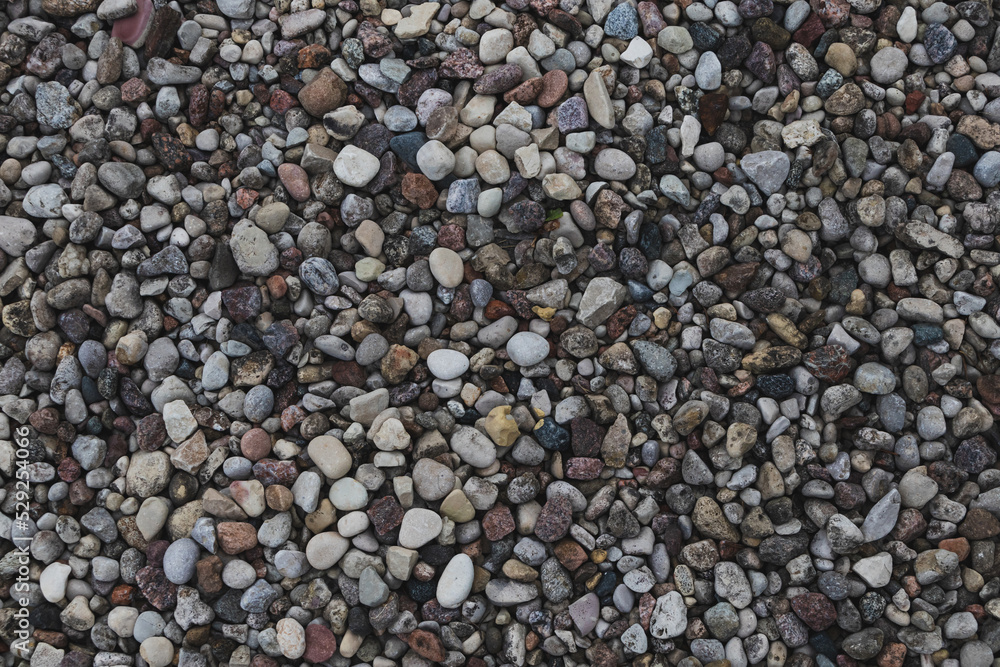 Textured background of stones, stone texture of different colors and shapes Textured background of stones, stone texture of different colors and shapes