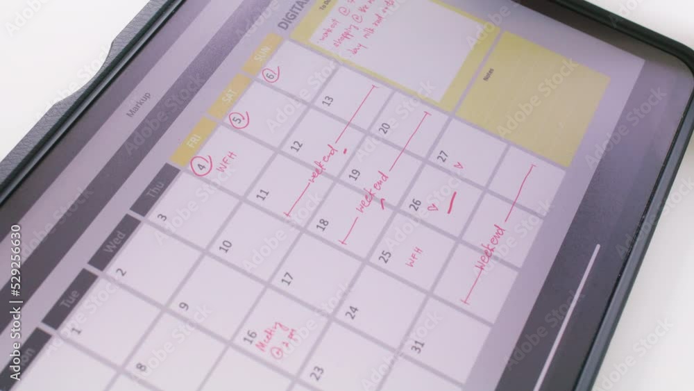Last day of workweek white collar work remote anywhere at home office workspace on Friday. Young workforce Hybrid workplace note event to do list app on tablet plan week time timeline on table desk.