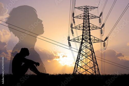 The idea of ​​scarcity of electricity. Desperate men have no money to pay for electricity. with high voltage transmission towers