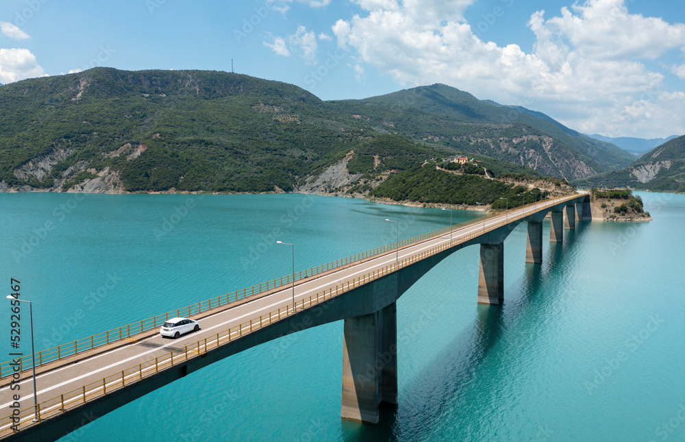 Aerial view of bridge, lake and mountains in Central Greece, Evrytania region. Lake Kremaston. Aerial view of bridge, lake and mountains in Central Greece, Evrytania region. Lake Kremaston.