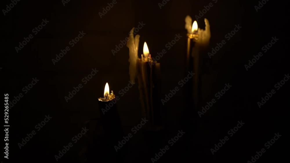 candles. three burning candles. timelapse. HD video. candles. three burning candles. timelapse. HD video.
