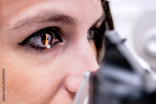 Woman during ocular tonometry procedure