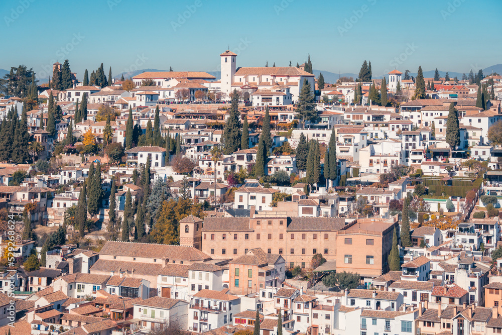 Houses and trees against cloudless sky Houses and trees against cloudless sky