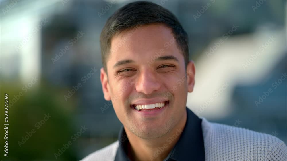 Entrepreneur man, happy and outdoor portrait with positive and friendly face expression with smile. Attractive, confident and handsome young business person with healthy and glowing teeth.