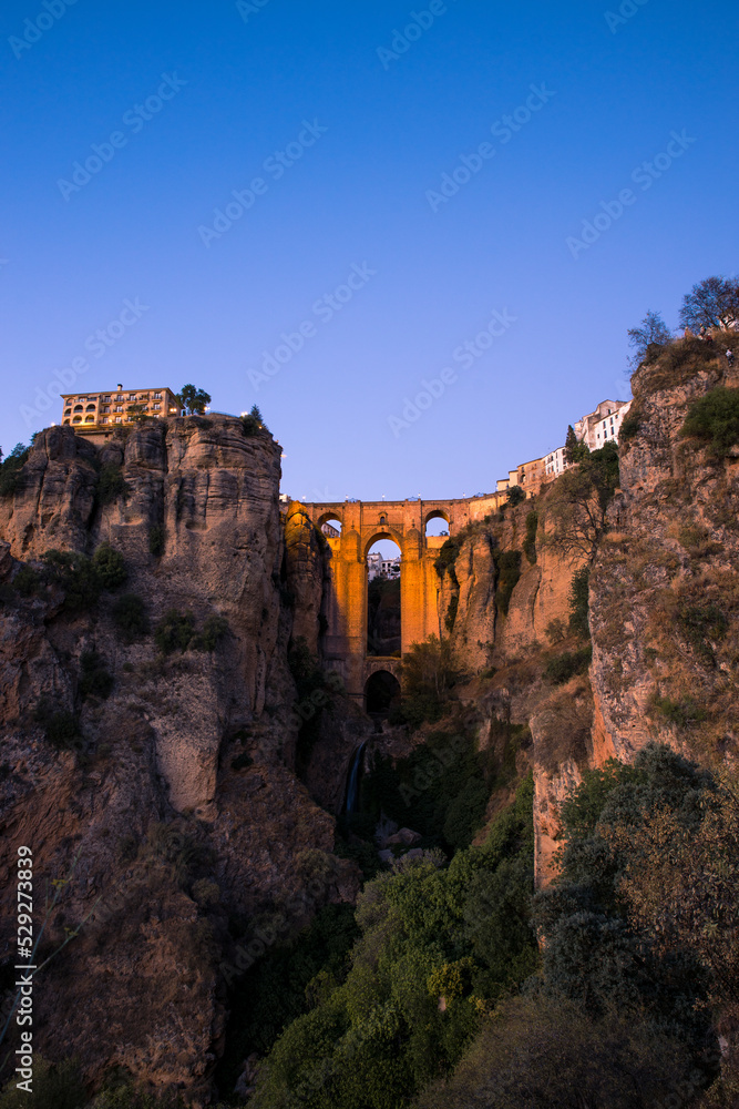Vertical photography of the bridge of Ronda at sunset (Ronda, Andalusia, Spain)