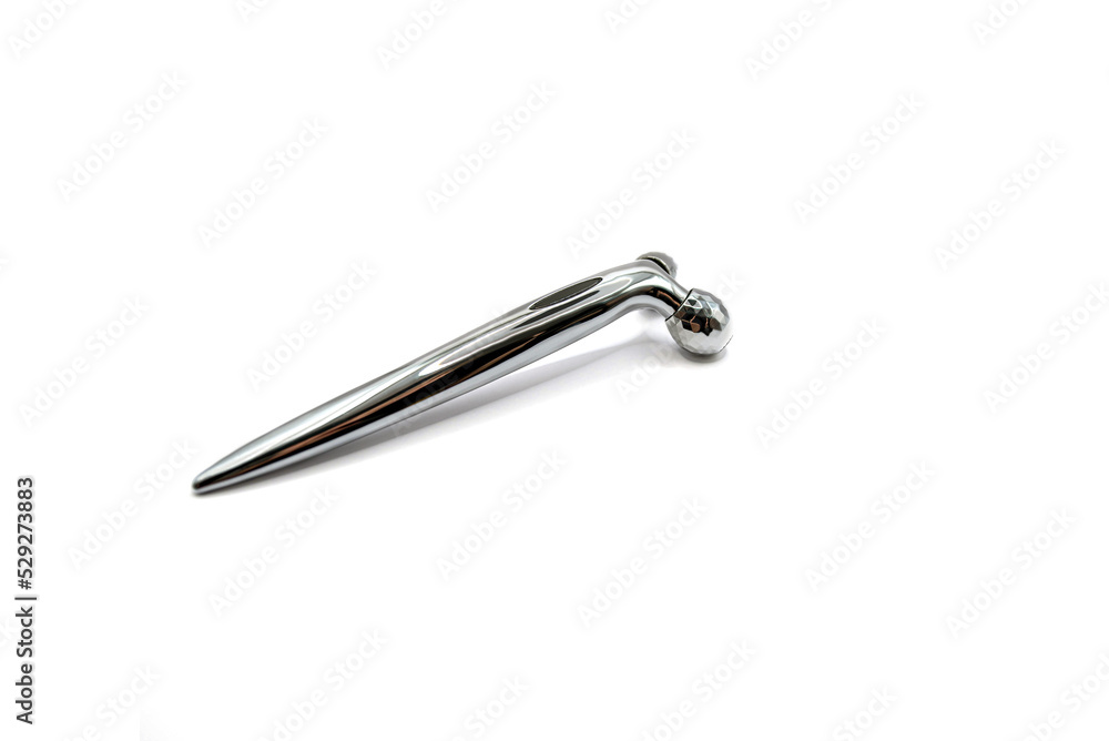 Modern metal face roller isolated on white side view Modern metal face roller isolated on white side view