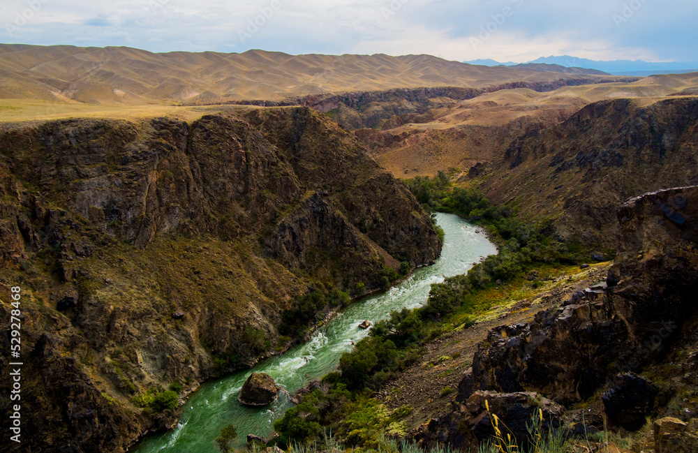 Scenic view of river in valley Scenic view of river in valley