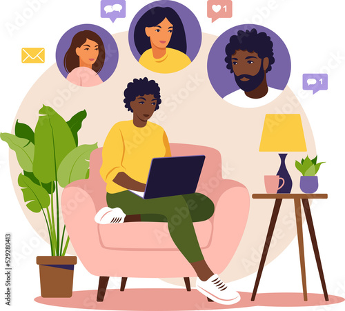 Concept of social promotion, refer a friend, refer and earn. Referral marketing. African woman sitting with laptop on armchair. 