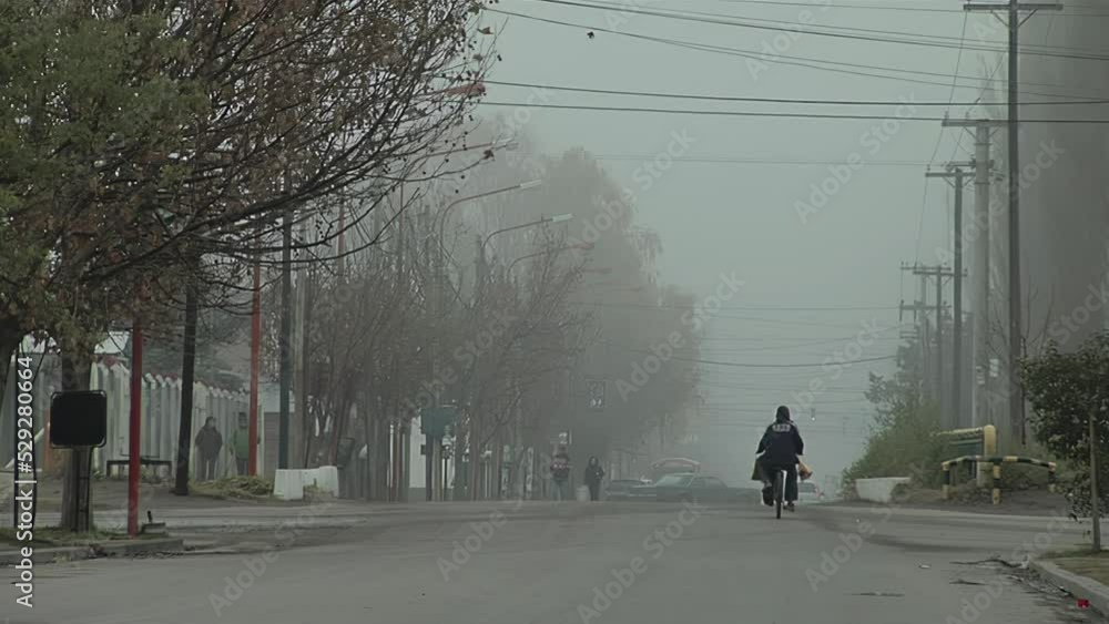 Movement on a Street during a Foggy Morning in Varvarco, Neuquen Province, Argentina. Movement on a Street during a Foggy Morning in Varvarco, Neuquen Province, Argentina.