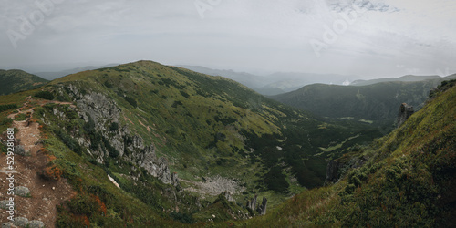 Carpathian mountain panoramic landscape. Shpytsi - one of the peaks of the Chornohora mountain range. Dangerous climbing site. Western Ukraine. © Andrii Marushchynets