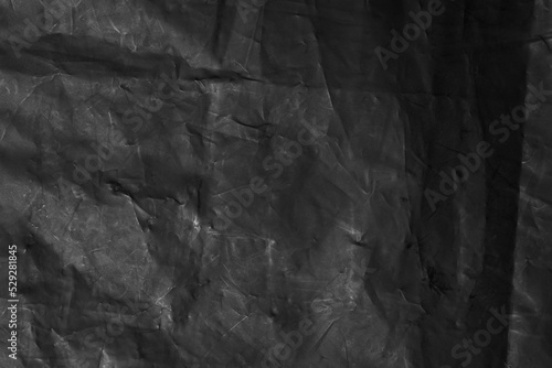 Abstract background of black polyethylene film.