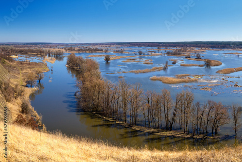 Spring landscape - flood in river valley of the Siverskyi  Seversky  Donets  the winding river over the meadows between hills and forests  the northeast of Ukraine