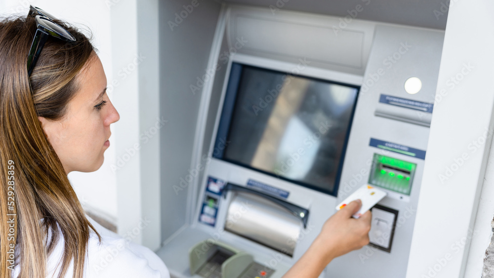 Atm machine screen. Holding american bill cash. Woman withdraw money usd hundred dollar. Money stack, bank credit card. Atm machine screen. Holding american bill cash. Woman withdraw money usd hundred dollar. Money stack, bank credit card.