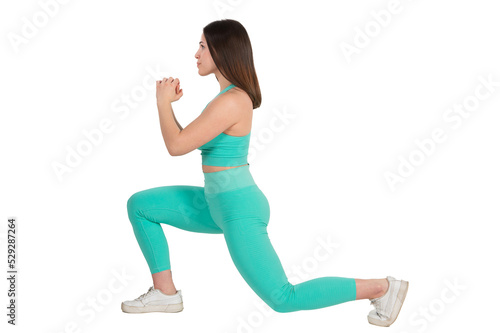 Fototapeta Naklejka Na Ścianę i Meble -  Young brunette woman during workout isolated over transparent background. 