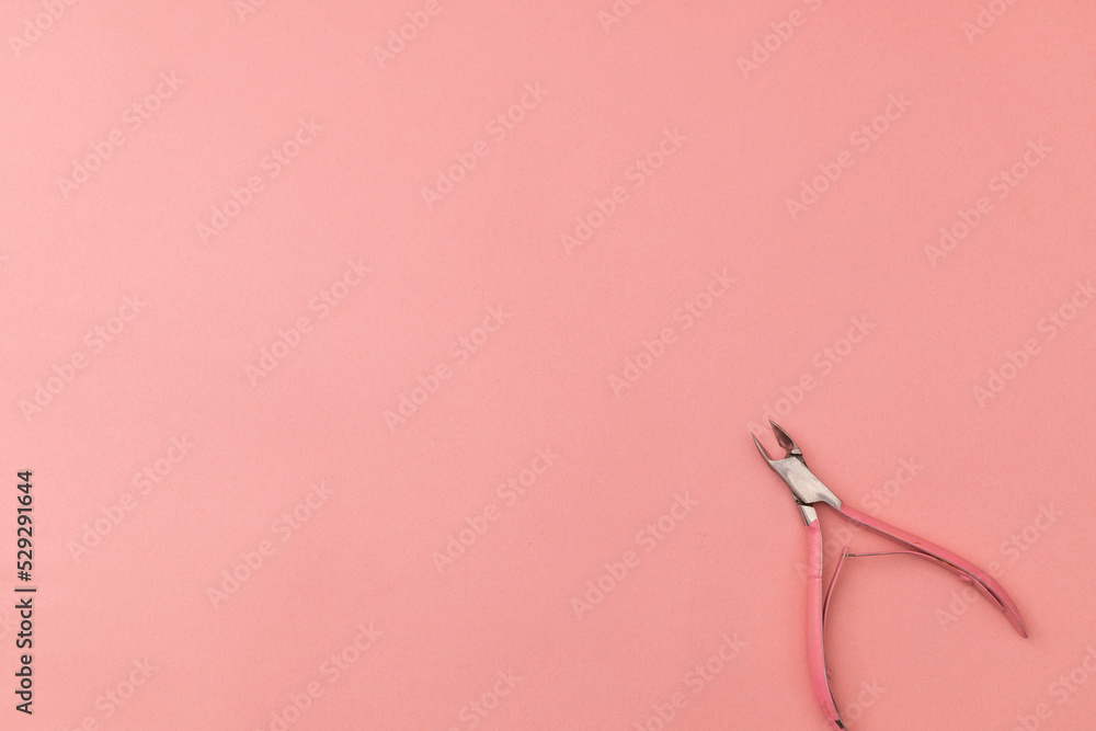 Tweezers for hands, pink on pink background - monochrome Tweezers for hands, pink on pink background - monochrome