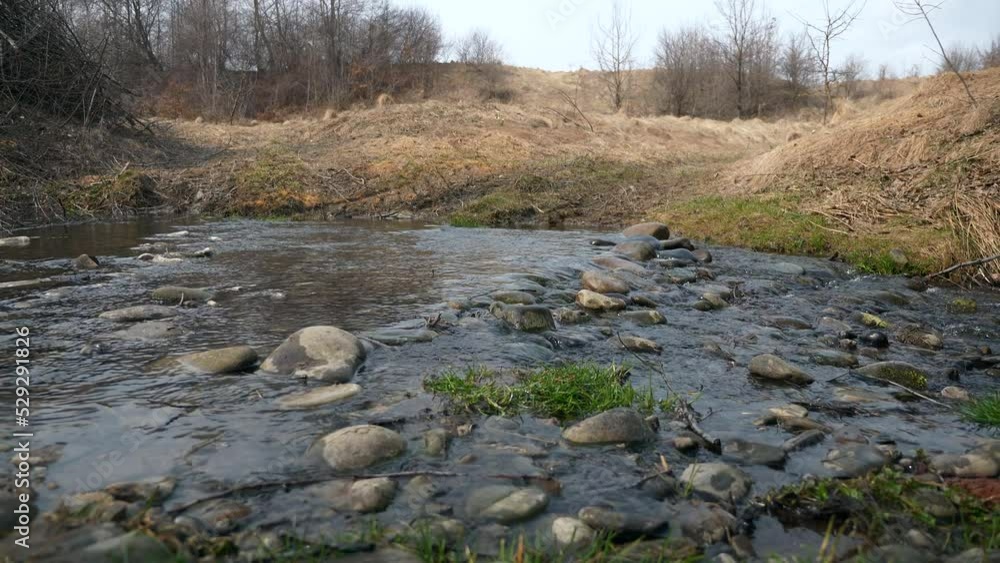 Small River Stone Stream. Spring Season Sunny Day. Rural Scene Background. Beautiful Nature Country. 2x Slow motion 60fps 4K Small River Stone Stream. Spring Season Sunny Day. Rural Scene Background. Beautiful Nature Country. 2x Slow motion 60fps 4K