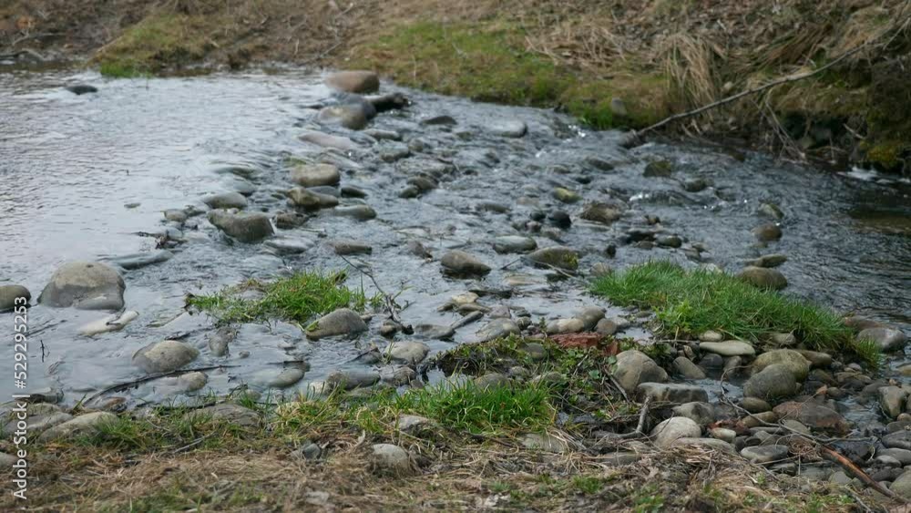 Small River Stone Stream. Spring Season Sunny Day. Rural Scene Background. Beautiful Nature Country. 2x Slow motion 60fps 4K Small River Stone Stream. Spring Season Sunny Day. Rural Scene Background. Beautiful Nature Country. 2x Slow motion 60fps 4K