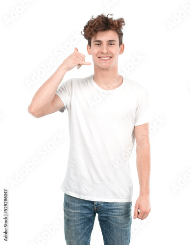 Happy young guy with a gesture of call with his hand