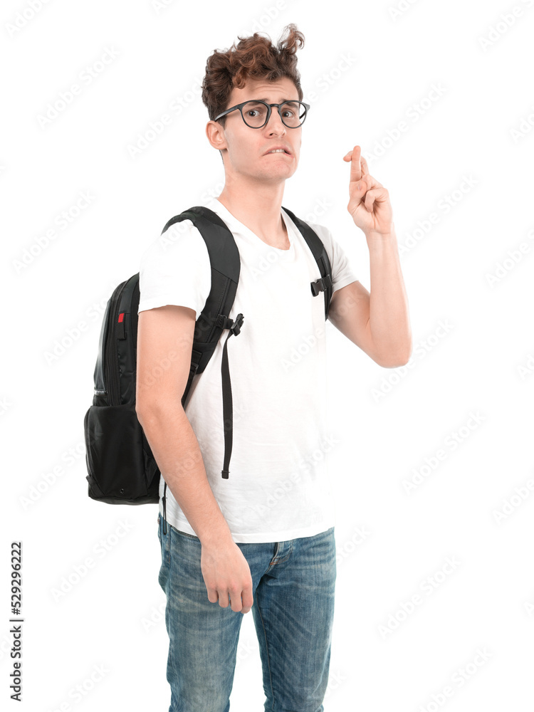 Hopeful young student with a crossed fingers gesture Hopeful young student with a crossed fingers gesture