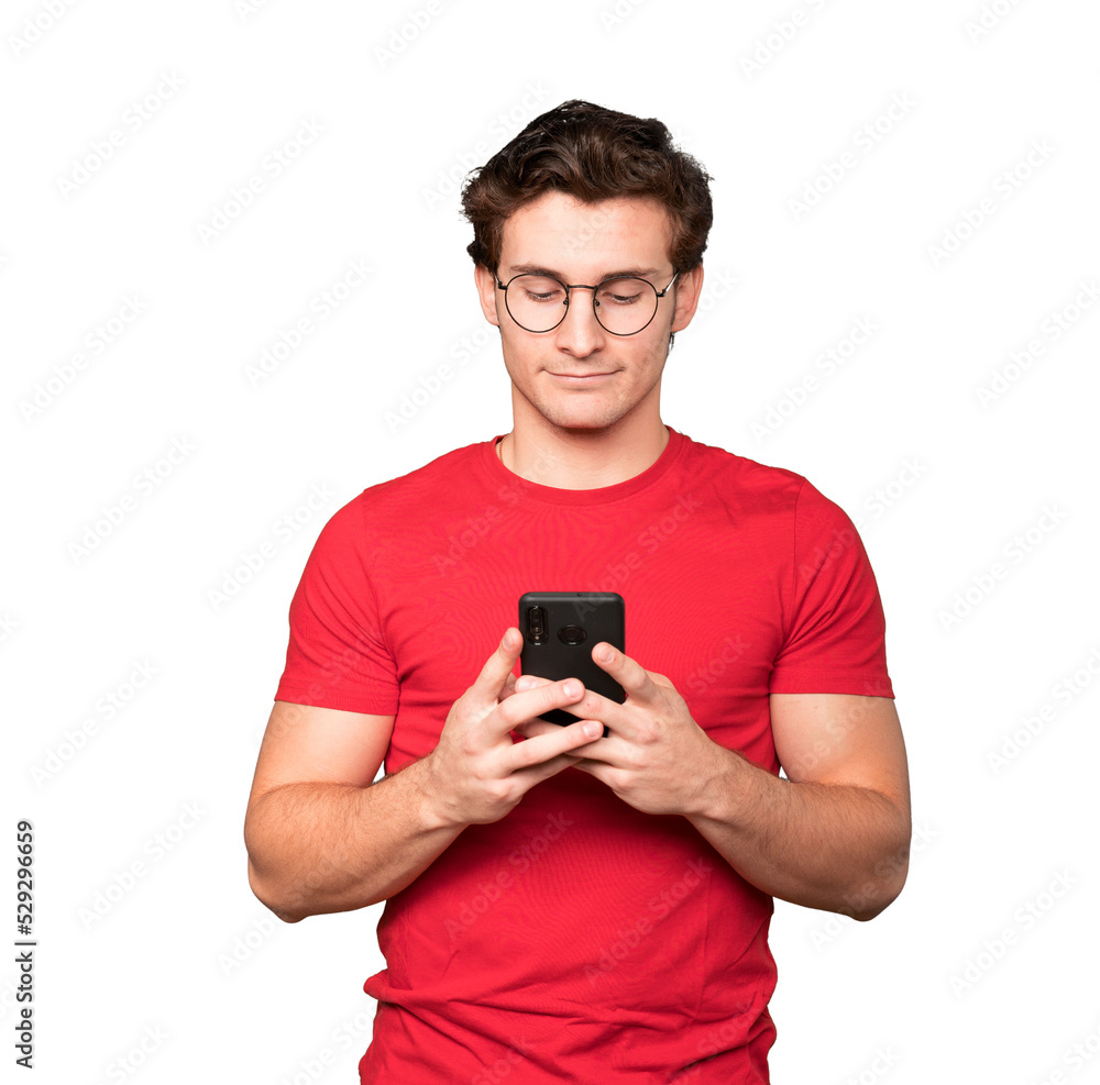 Thoughtful young man using his mobile phone Thoughtful young man using his mobile phone