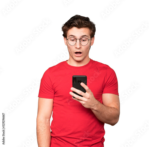 Worried young man using his mobile phone © agongallud