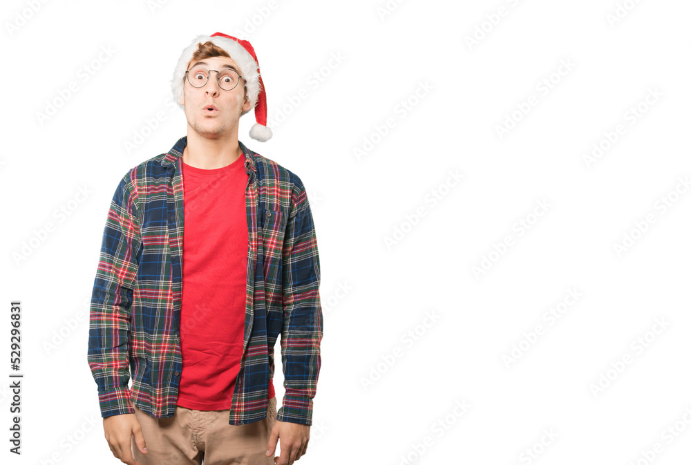 Young man at Christmas doing gestures Young man at Christmas doing gestures