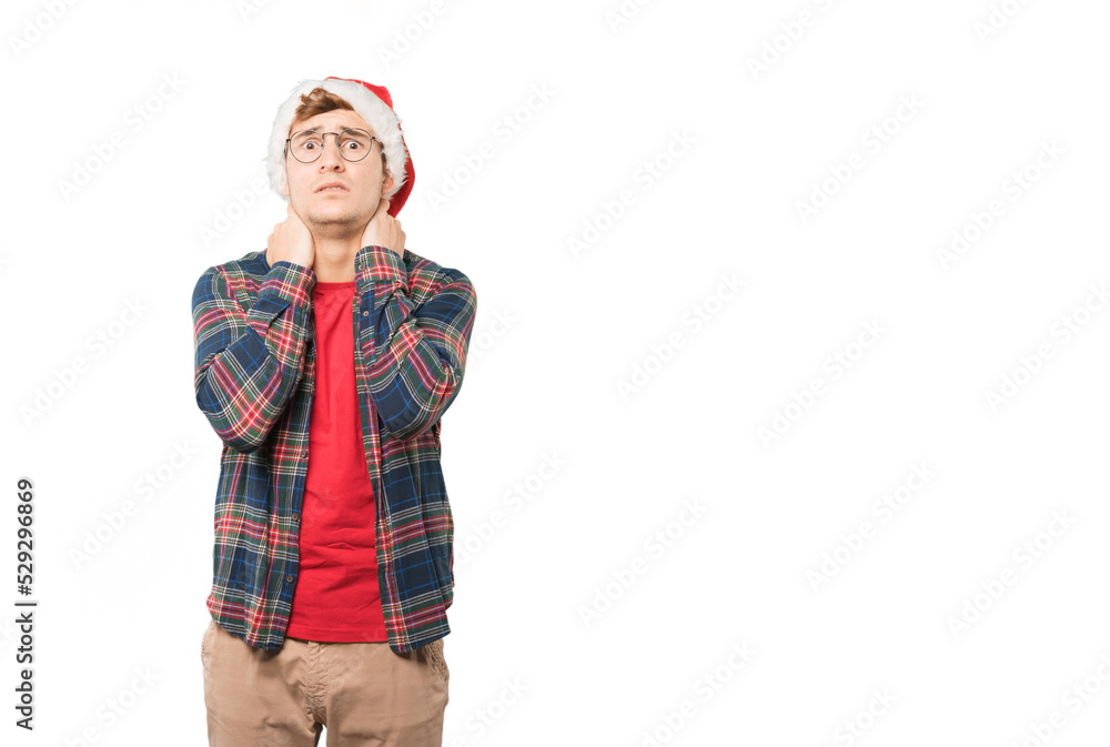 Young man at Christmas doing gestures Young man at Christmas doing gestures