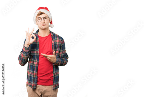 Young man at Christmas doing gestures