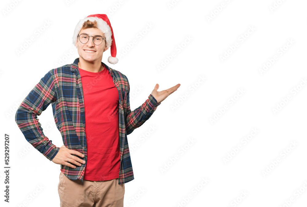 Young man at Christmas doing gestures Young man at Christmas doing gestures