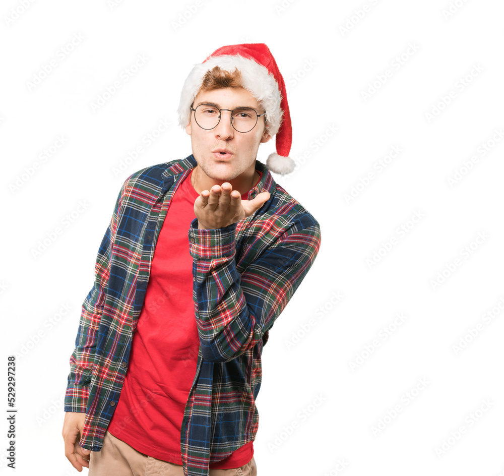 Young man at Christmas doing gestures Young man at Christmas doing gestures