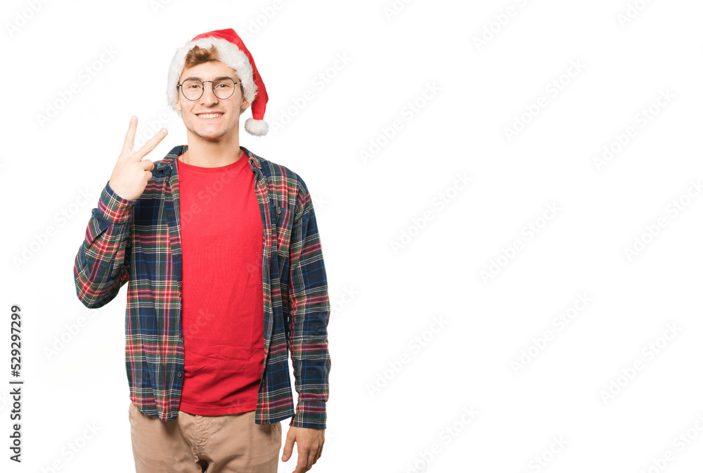Young man at Christmas doing gestures Young man at Christmas doing gestures