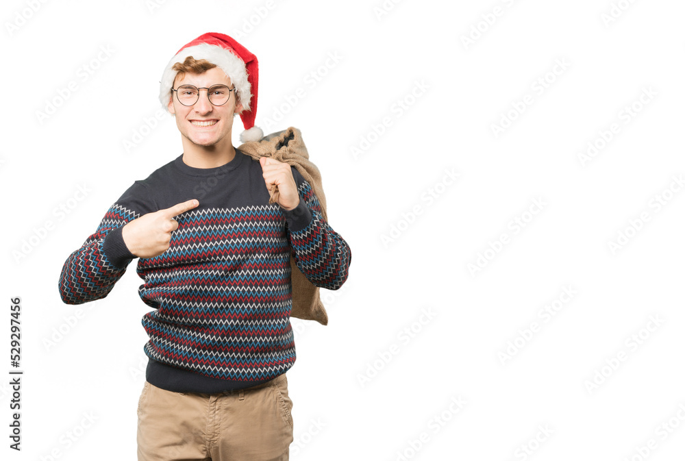 Young man at Christmas doing gestures Young man at Christmas doing gestures