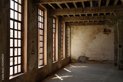  interior of old industrial warehouse with wooden beams