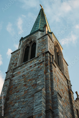 tall church against the clouds
