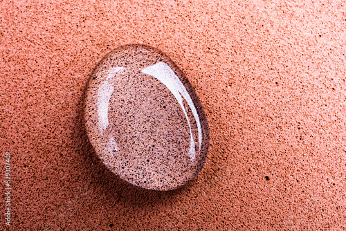 Close-up of water drop on table