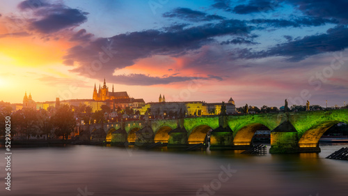 Charles Bridge in Prague in Czechia. Prague, Czech Republic. Charles Bridge (Karluv Most) and Old Town Tower. Vltava River and Charles Bridge. Concept of world travel, sightseeing and tourism.