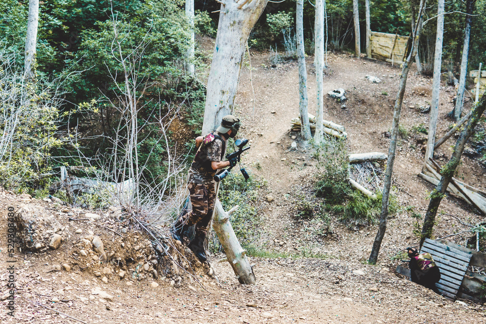 High angle view of army soldiers training in forest High angle view of army soldiers training in forest