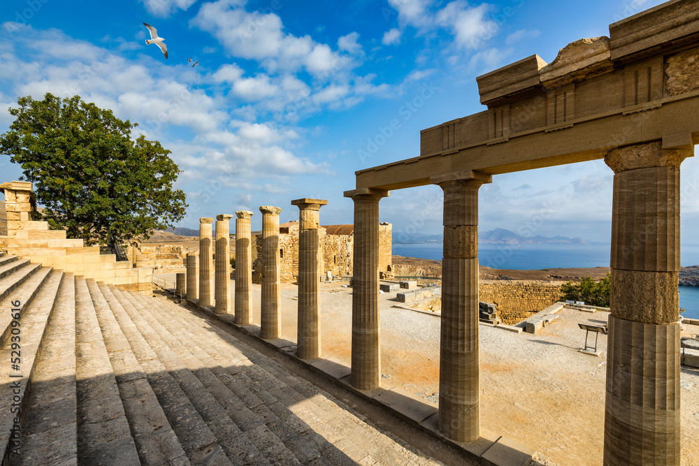Ruins of Acropolis of Lindos view, Rhodes, Dodecanese Islands, Greek Islands, Greece. Acropolis of Lindos, ancient architecture of Rhodes, Greece.