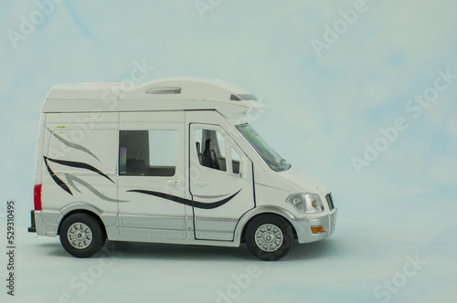 Motorhome camper van trailer toy on ligth background