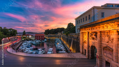 The Land Gate in Zadar at sunset, the main entrance into the city, built by a Venetian architect Michele Sanmicheli in 1543, Zadar, Croatia. The Land Gate to the Old City of Zadar, Croatia.